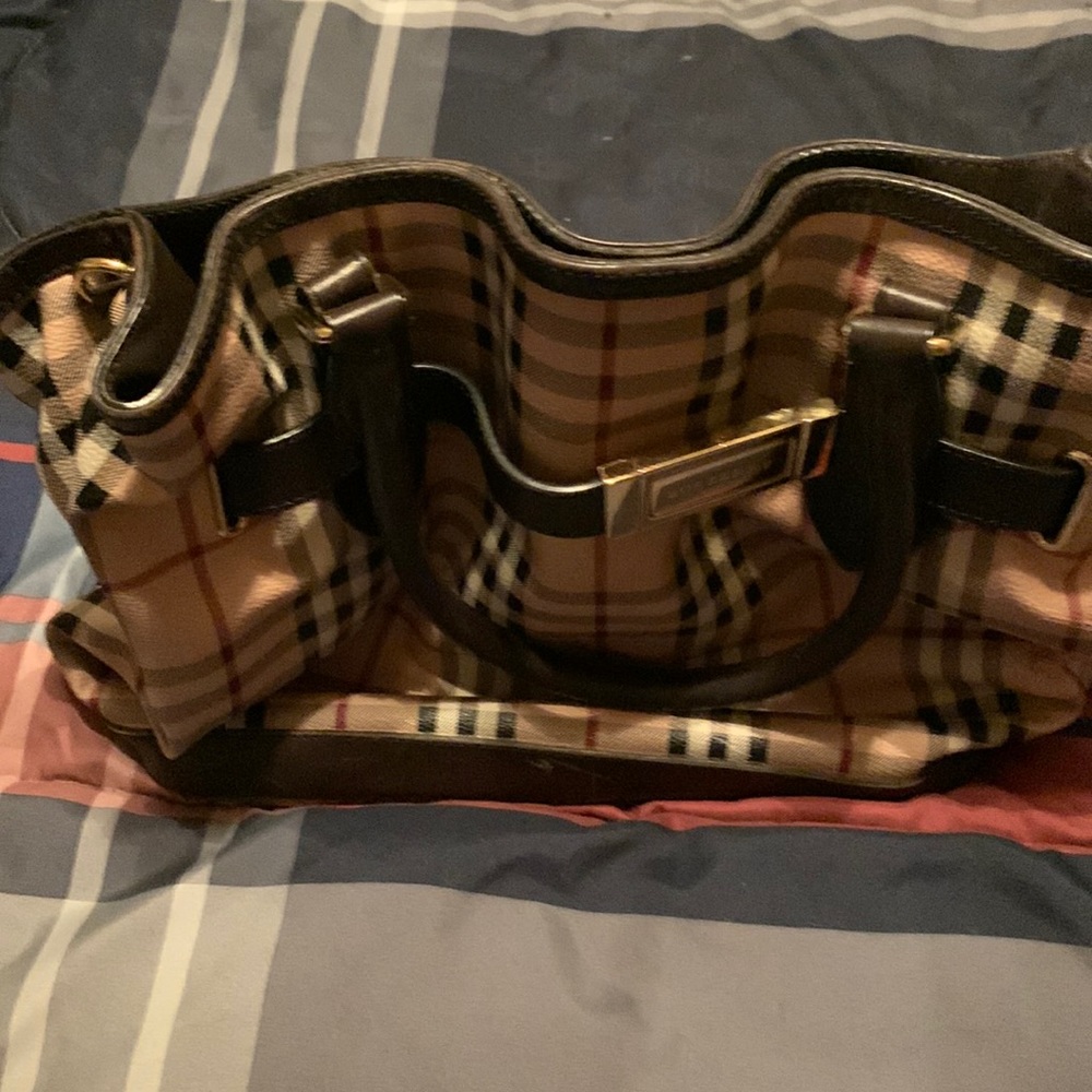 Burberry Bag get it at good price. She’s a beauty.